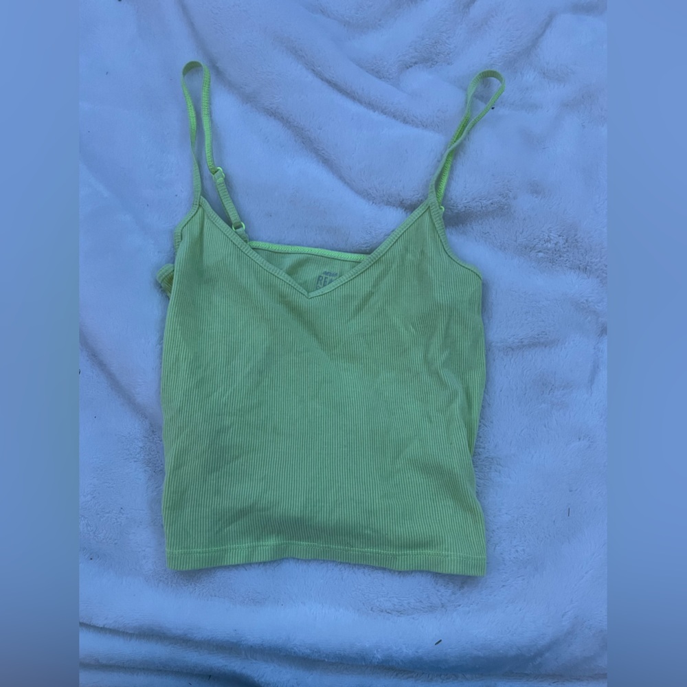 Bright yellow crop tank.